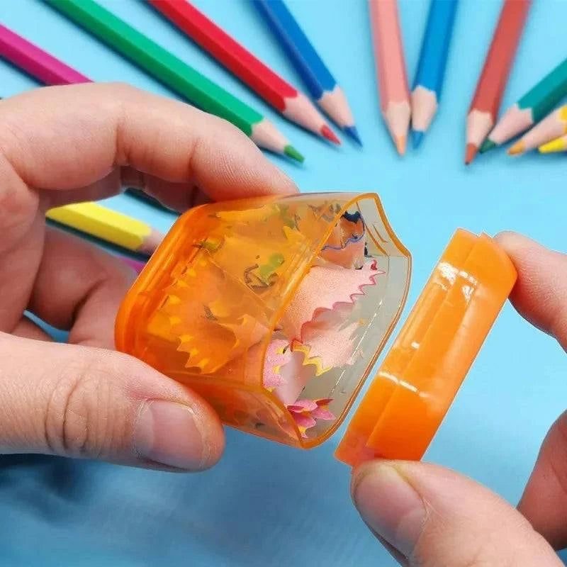 Lot de 4 taille-crayons manuels en plastique transparent et coloré.