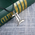 Ensemble carnet d'anime : carnet en cuir, collier et stylo plume